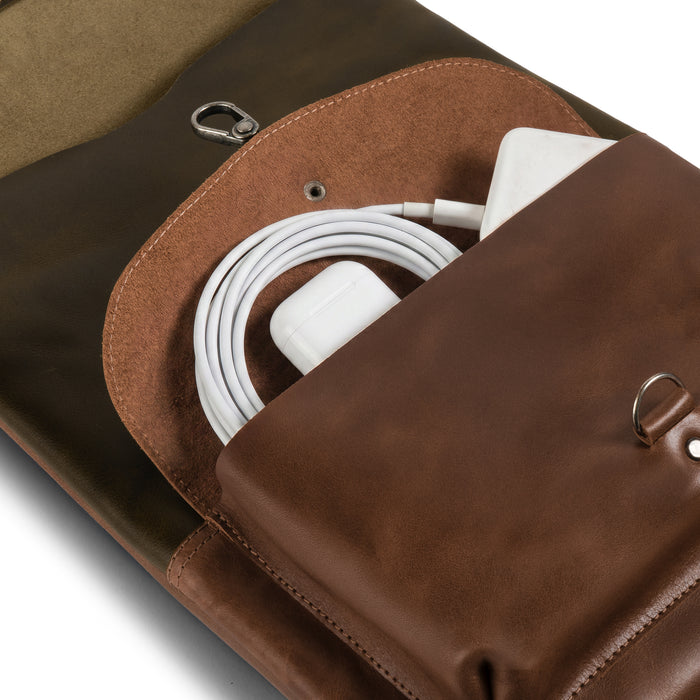 Detail shot of the Adventurer Laptop Bag by Littlefield Chicago, showing the interior pocket designed for holding chargers and cables securely. This artisan-made case is perfect for your laptop travel needs. Leather Adventurer Laptop Case, Extra Bag for Charger and Cables, Hanging Bag for Computer, Rustic Cover, Travel Accessories, Full Grain Leather, Small Batch Production, Hand Cut, Hand Sewn, Artisan, Handmade in La Antigua Guatemala & Oaxaca Mexico.