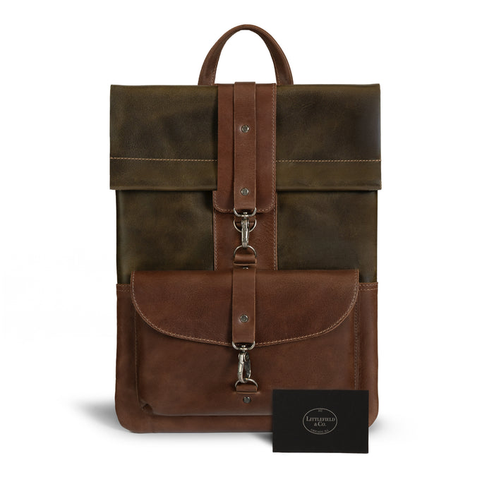 Adventurer Laptop Bag by Littlefield Chicago, displayed with branding card, showcasing its vintage-style design and high-quality craftsmanship. Ideal for stylish tech users. Leather Adventurer Laptop Case, Vintage Sleeve for 13-inch Laptops with Extra Bag for Charger and Cables, Rustic Cover, Travel Accessories, Full Grain Leather, Small Batch Production, Hand Cut, Hand Sewn, Artisan, Handmade in La Antigua Guatemala & Oaxaca Mexico.