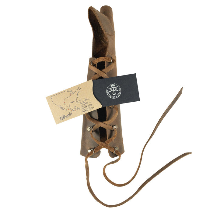 The Archery Forearm Protector by Valhalla Gear displayed with its packaging, emphasizing its artisan quality and full grain leather. This arm guard is perfect for bow shooting practice, cosplay, and training, representing the handmade tradition from La Antigua Guatemala & Oaxaca Mexico.