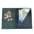 Bifold Check Presenter With Pen Slot by Hide & Drink, paired with coins demonstrating its suitability for cash management in dining situations. A practical and stylish accessory for servers. Bifold Check Presenter with Pen Slot for Restaurant & Cafe Accessories, Western Bill Holder, Full Grain Leather, Handmade Waiter and Waitress Accessory, Small Batch Production, Hand Cut, Hand Sewn, Fire Branded, Artisan, Handmade in La Antigua Guatemala & Oaxaca Mexico.