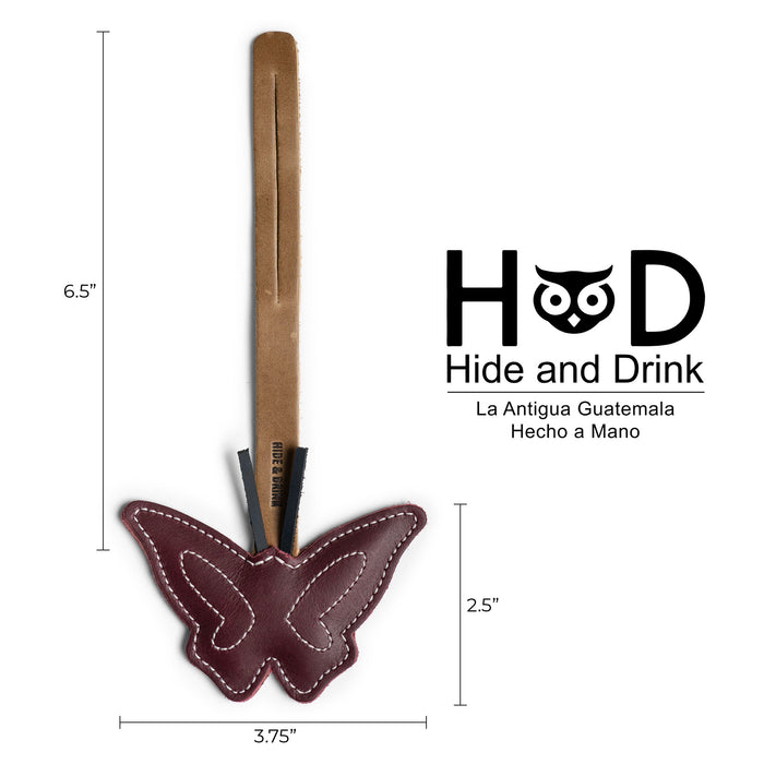 Hide & Drink Bag Charms illustrating dimensions for an enchanting penguin design. This charm for handbags is perfect as a purse charm for tote & backpacks, crafted from durable full grain leather. Capturing StockyardX's commitment to small batch production, each item showcases hand cut and hand sewn artistry along with fire branding, handmade in La Antigua Guatemala & Oaxaca Mexico.