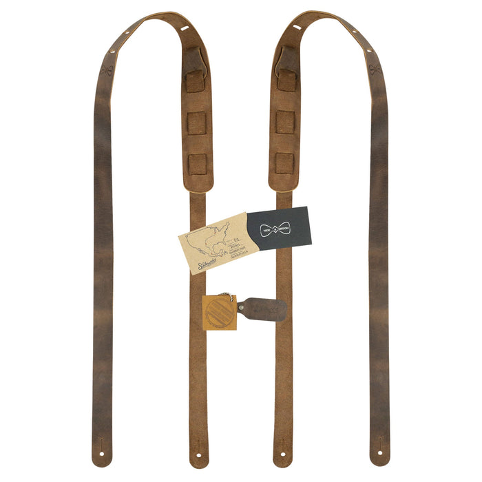 Complete set of Hide & Groom's Button End Suspenders, including branding and care information. These full grain leather suspenders are perfect for groomsmen and best men at weddings or dinner parties. Artisan crafted in La Antigua Guatemala with attention to detail.