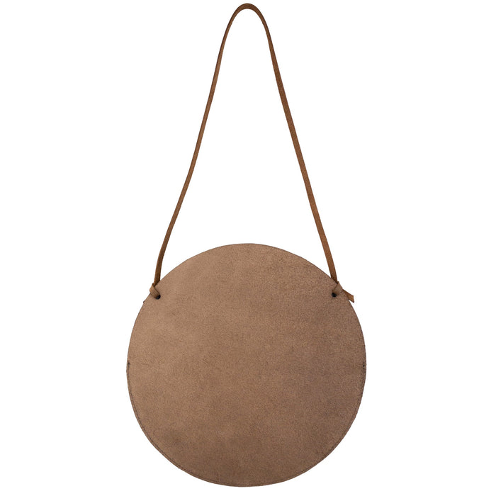 Back view of the Leather At Home Circular Wall Hanger, crafted from durable full grain leather. Ideal as a door hanger for documents, featuring a minimalist design. Each piece is fire branded and made by hand in La Antigua Guatemala.