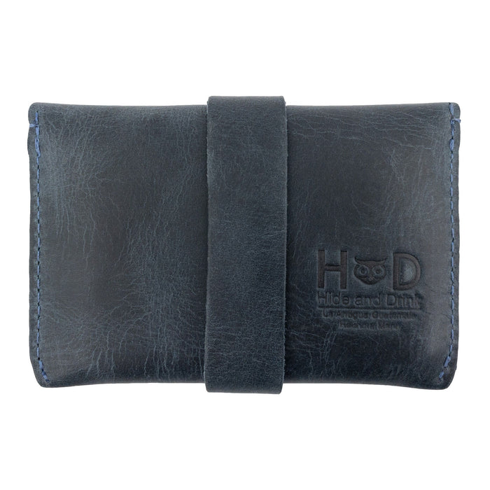 Front view of Hide & Drink's navy Credit Card Holder, featuring a sleek design made from Full Grain Leather. This minimalist wallet is handmade and exemplifies artisan skill from La Antigua Guatemala.