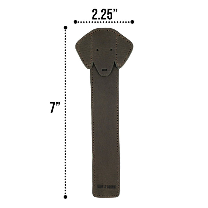 Hide & Drink's dimensions of the brown Dog Bookmark showcasing its Full Grain Leather material. This handmade bookmark reflects the artistry of small batch production and fire branding, proud of its roots in La Antigua Guatemala & Oaxaca Mexico.