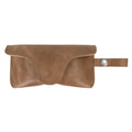 Eyeglasses Case with Strap by Hide & Drink alongside gift packaging, perfect for a present. Crafted from full grain leather, this stylish protector for eyewear exemplifies quality artisan craftsmanship in La Antigua Guatemala & Oaxaca Mexico.