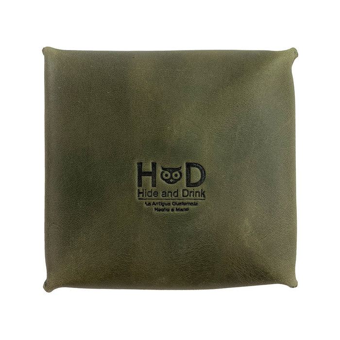Front view of a Hide & Drink Jewelry Pouch highlighting its unique leather texture. Perfectly suitable for rings and other small trinkets, enhancing wedding celebrations.