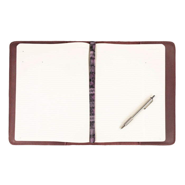 The Journal Cover for (8.5 x 11 in.) Moleskine Cahier XXL by Hide & Drink shown with subtle elegance in full grain leather. Offers sturdy protection and style for your notebook, handmade in La Antigua Guatemala & Oaxaca Mexico.