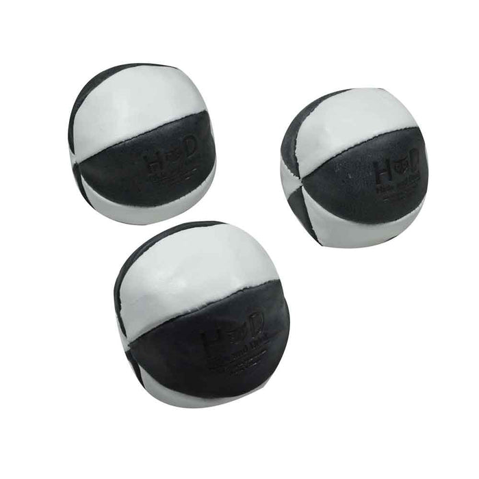 Hide & Drink Leather Juggling Balls (3-Pack) featuring a stylish black and white design. Full Grain Leather Juggling Balls Set of 3, produced via Small Batch Production, Hand Cut, Hand Sewn, and Fire Branded by skilled Artisans. Handmade in La Antigua Guatemala & Oaxaca Mexico.