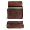 Hide & Drink's Vintage Folder Holder showcasing a sleek design made from Handmade Leather. This stylish Document Holder is perfect for carrying documents, featuring a vintage envelope aesthetic crafted from Full Grain Leather. Ideal office accessories, each item represents Small Batch Production, made in La Antigua Guatemala & Oaxaca Mexico.