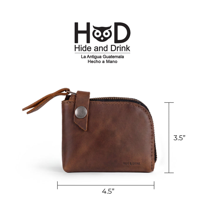 Lion's Mane Zippered Wallet by Hide & Drink with size comparison to a credit card. This handmade wallet is a brilliant small batch production piece, perfect for holding up to 6 cards and folded bills.
