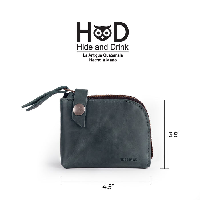 Size and comparison of the Lion's Mane Zippered Wallet by Hide & Drink with a credit card. A mini wallet that combines functionality with artisan craftsmanship.