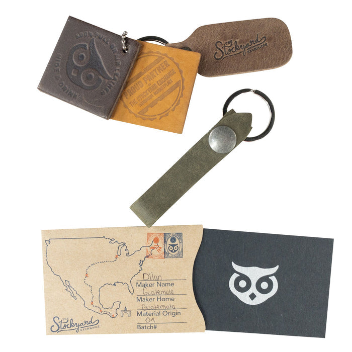 Hide & Drink Loop Keychain featuring a stylish navy strap and durable design. This artisan crafted keyring organizer is made from full grain leather, representing the quality of small batch production from La Antigua Guatemala & Oaxaca Mexico.