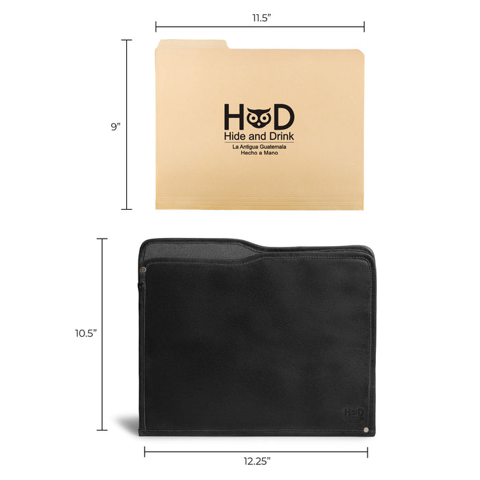The Manila Folder by Hide & Drink flaunting tags, emphasizing its quality as a Document Holder. Made of Full Grain Leather, this piece is a reflection of Small Batch Production, crafted by artisans in La Antigua Guatemala and Oaxaca Mexico.