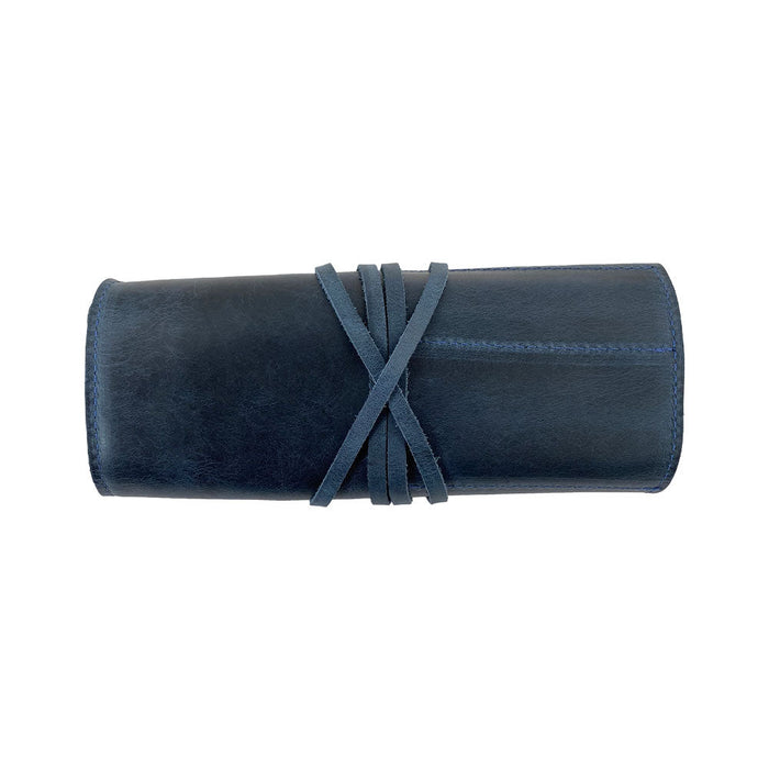 Hide & Drink Multi Purpose Pencil Roll in its natural closed form, highlighting the sturdy leather and practical design ideal for storing essential tools. An artisan-made rustic pouch perfect for craft and work organization.