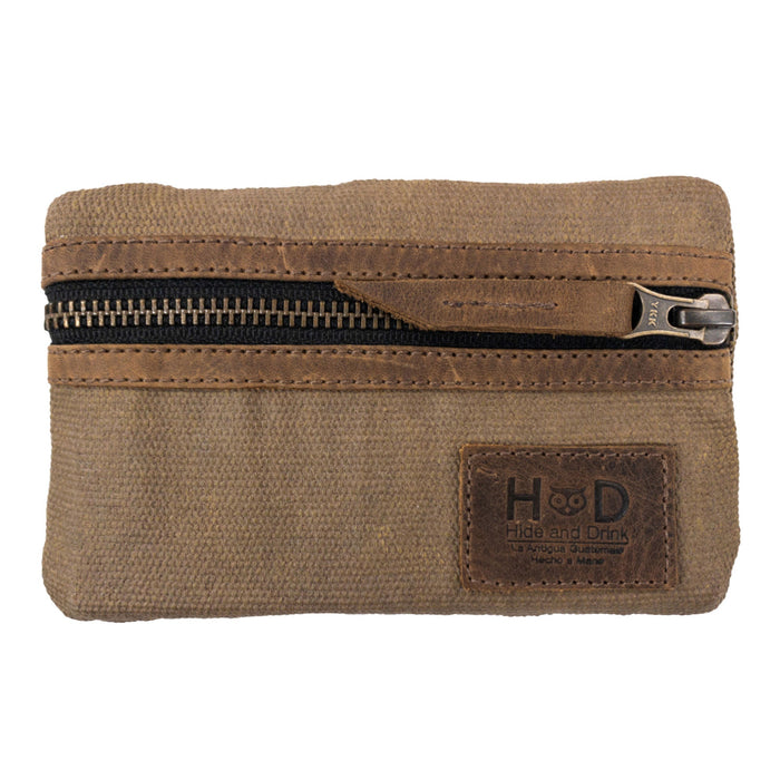 Close-up of the zippered Multi-tool Pocket Pouch by Hide & Drink showcasing a stylish and durable exterior, made from waxed canvas and full grain leather, ideal for a slim organizer.