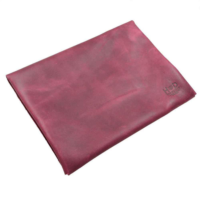 Front view of Hide & Drink's bold red Multipurpose Portfolio, designed with premium Full Grain Leather, perfect for travel and daily use as an organizer for tablets, phones, and essential accessories. Handmade in La Antigua Guatemala & Oaxaca Mexico.