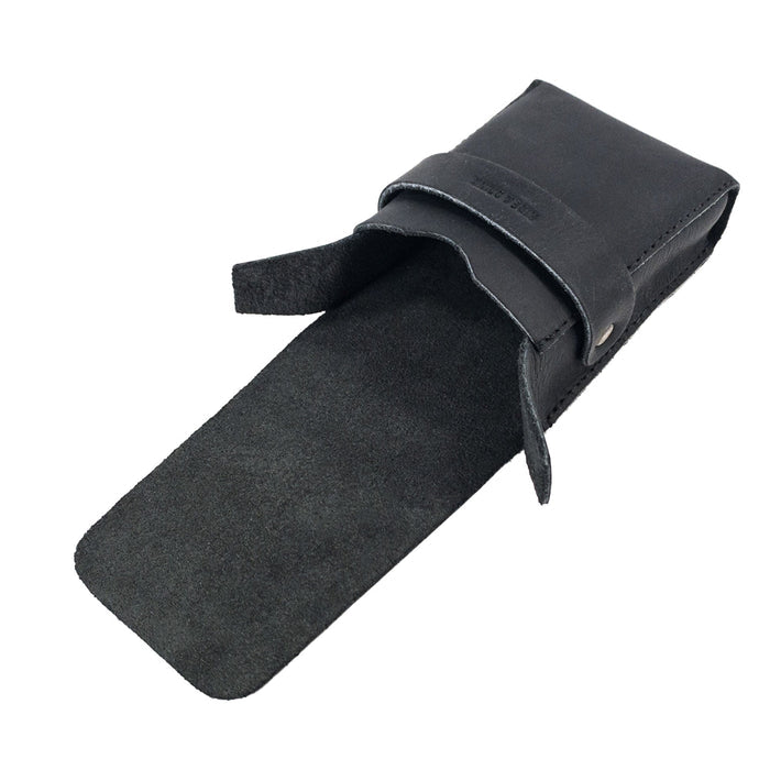 Open view of Hide & Drink's Playing Card Case showing the soft suede interior. Ideal for securely storing your classic playing cards (not included), this travel accessory is made of full grain leather. Handcrafted by artisans in La Antigua Guatemala, it's a quality product from StockyardX.