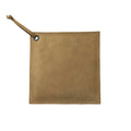 Hide & Drink Pot Pad in olive green leather, combining rustic style and practical function. This handcrafted hot pot pad is designed to withstand high temperatures.