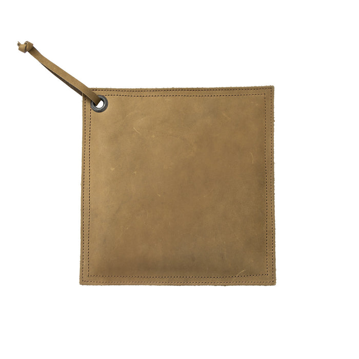 Hide & Drink Pot Pad in olive green leather, combining rustic style and practical function. This handcrafted hot pot pad is designed to withstand high temperatures.