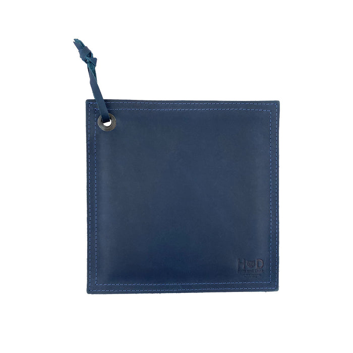 Hide & Drink Pot Pad in a vibrant black leather finish, beautifully designed for kitchen use. This double-layered rustic potholder is perfect for handling hot items with ease.