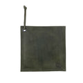 Hide & Drink Pot Pad in deep blue leather, showcasing its artisan craftsmanship. Perfect for protecting surfaces from hot items, it combines practicality with style.