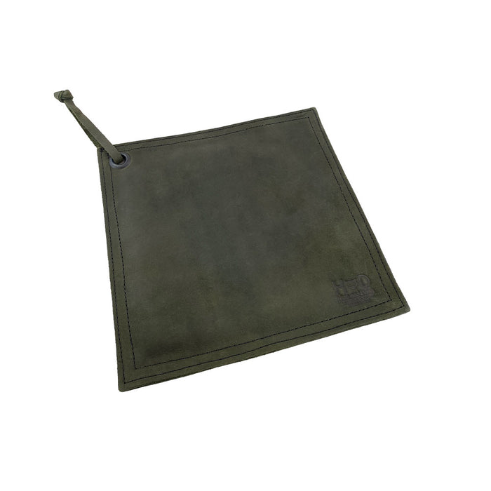 Side view of the Hide & Drink Pot Pad featuring its handcrafted quality and rustic detailing. This artisan pot pad is made for effective heat resistance.