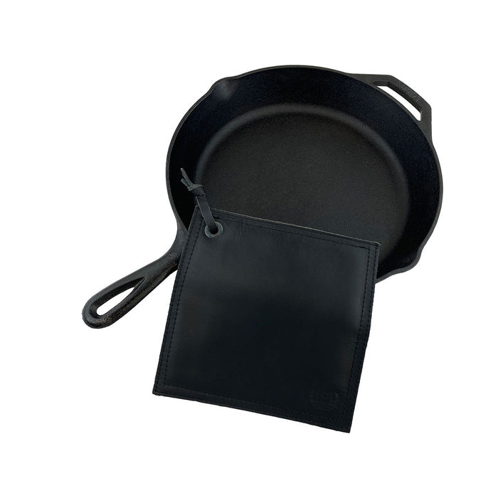 Hide & Drink Pot Pad featuring dimensions on display, highlighting its practical use in the kitchen. This handcrafted double-layered pot holder is perfect for hot pans.