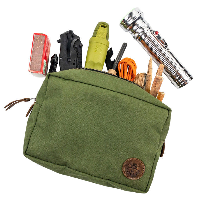 Open view of the Rectangular Utility Bag for Camping from Valhalla Gear, filled with essential gear, showcasing its spacious interior, handcrafted from water-resistant canvas and full grain leather in La Antigua Guatemala.