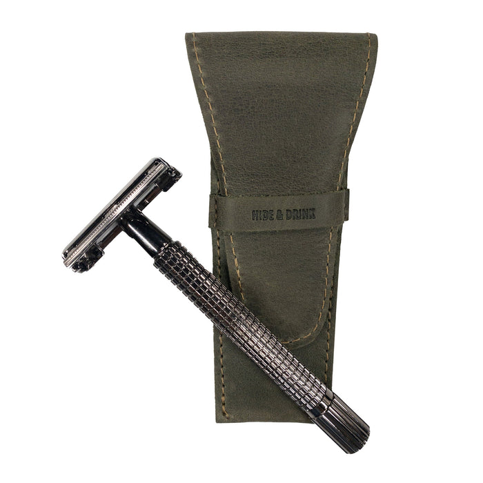 Hide & Drink Safety Razor Case in green with a razor inside, showcasing the unique design and premium Full Grain Leather of this personal care item.