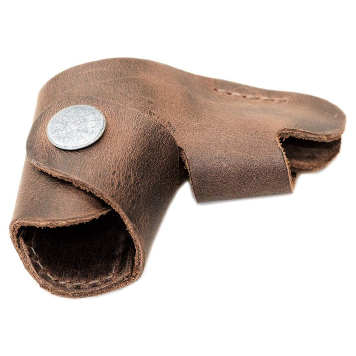 Hide & Drink Shift Lever Sock made from Full Grain Leather, designed for motorcycle lovers, providing shifter shoe protection. This artisan, handmade product features small batch production with hand cut and hand sewn craftsmanship, proudly made in La Antigua Guatemala & Oaxaca Mexico.