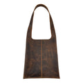 Stylish Shoulder Bag for Laptop by Hide & Drink made from full grain leather, perfect for MacBook Air/Pro, 13 Inch with M1 Chip. This artisan handmade messenger bag features small batch production, hand cut and sewn craftsmanship, and is fire branded. Ideal as a travel bag, showcasing the quality and durability of leather, crafted in La Antigua Guatemala & Oaxaca Mexico.