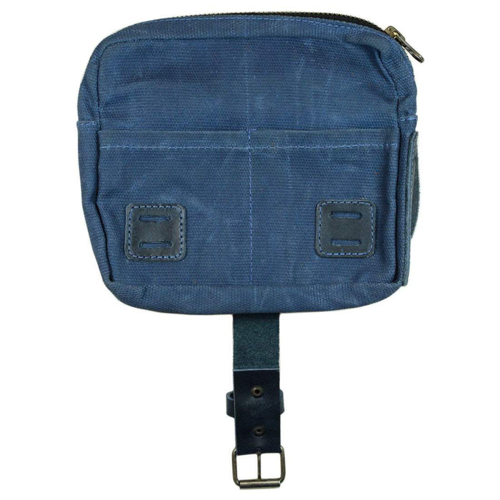 Back view of the blue Survival Camping Pouch from Hide & Drink, highlighting pockets and strap. Constructed from Water Resistant Waxed Canvas & Full Grain Leather, it's perfect for your outdoor gear and survival essentials.