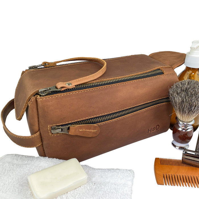 Hide & Drink's Toiletry Bag shown containing grooming essentials, showcasing its utility. This Full Grain Leather Toiletry Bag is an ideal Hand Bag or Dopp Kit Organizer for any occasion. StockyardX, Handmade, S.
