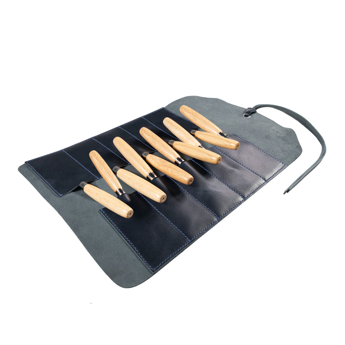 Hide & Drink Tool Roll introduces a robust small tool roll-up bag with 10 slots, made from premium full grain leather. Perfectly designed as a portable carry-on pouch for woodworking tools, it is suitable for any workshop storage setup. Handmade by artisans in La Antigua Guatemala & Oaxaca Mexico, underlining quality craftsmanship.