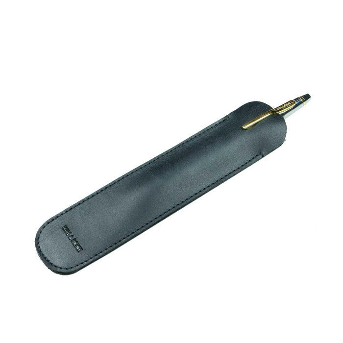 A close-up of the Vintage Pen Sleeve from Hide & Drink featuring its elegant lines and handcrafted quality. Made from durable Full Grain Leather, this artisan product is synonymous with hand cut and hand sewn craftsmanship.