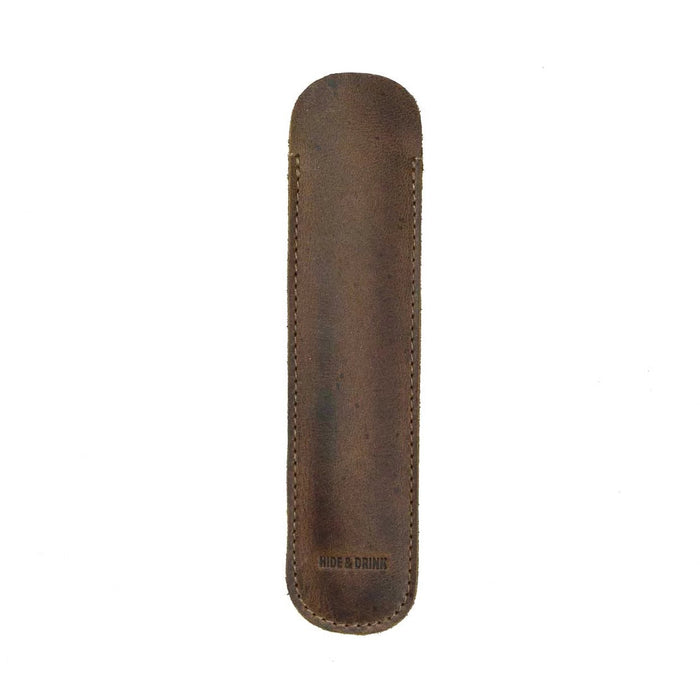 A close-up of the Vintage Pen Sleeve from Hide & Drink, highlighting its exquisite craftsmanship and quality of Full Grain Leather. This handmade item is perfect for those who appreciate artisan products in their office essentials.