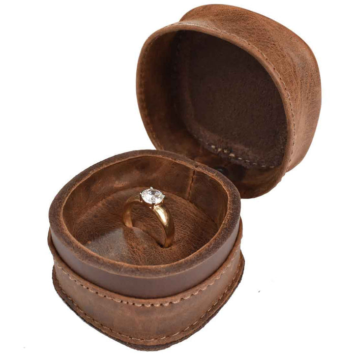 Wedding Ring Box featuring a gold engagement ring inside. Made by Hide & Drink from Full Grain Leather, this small batch production item is a perfect gift for newlyweds, combining stylish design with handmade quality from skilled artisans in La Antigua Guatemala & Oaxaca Mexico.