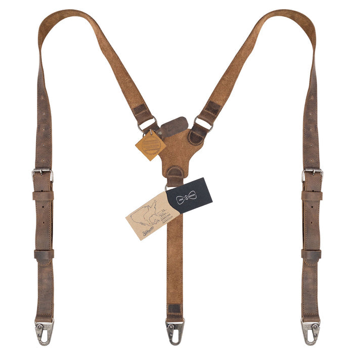 Leather Y Back Formal Suspenders by Hide & Groom with tags attached, showcasing their handmade quality. These Full Grain Leather Y Back Formal Suspenders are a unique touch for weddings, blending Steampunk Style with artisan craftsmanship from La Antigua Guatemala.