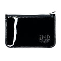 Hide & Drink Zippered Wallet showcasing a sleek design in glossy black, perfect for storing cards, folded bills, and coins. Ideal travel accessory made from full grain leather, reflecting artisan craftsmanship with small batch production, hand cut and hand sewn in La Antigua Guatemala & Oaxaca Mexico.
